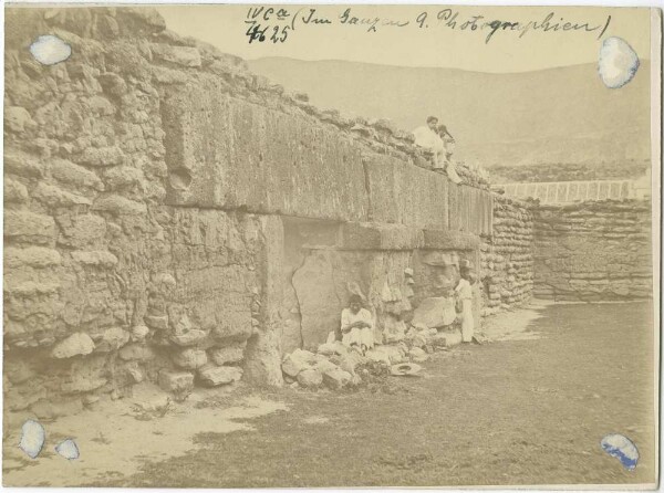 "Presumably the courtyard of a temple palace. (with members of the expedition)"