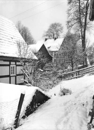 Elbsandsteingebirge. Hintere Sächsische Schweiz. Winterliches Dorfbild. Vermutlich Hinterhermsdorf oder Saupsdorf