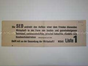 Maueranschlag mit einem Zitat aus dem Wahlprogramm der SED