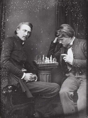 Wolf und Händler beim Schachspiel