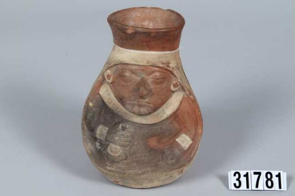 Vessel in the shape of a woman with rattle