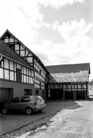 Wohn- und Geschäftshaus und Scheunengebäude (Wohn- und Geschäftshaus, Fachwerk); Gemünden, Mühlgasse 1