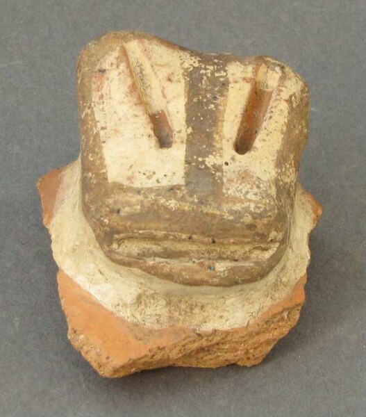 Fragment of a clay vessel