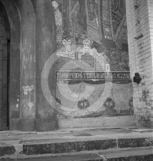 Wandgemälde an der Fassade einer Kirche in Ostpolen