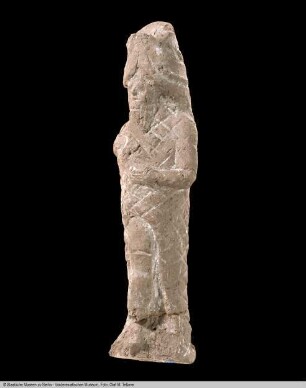Statuette eines Mannes im Fisch-Gewand