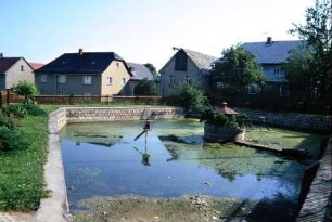 Dorfteich, Blick auf Hof 38