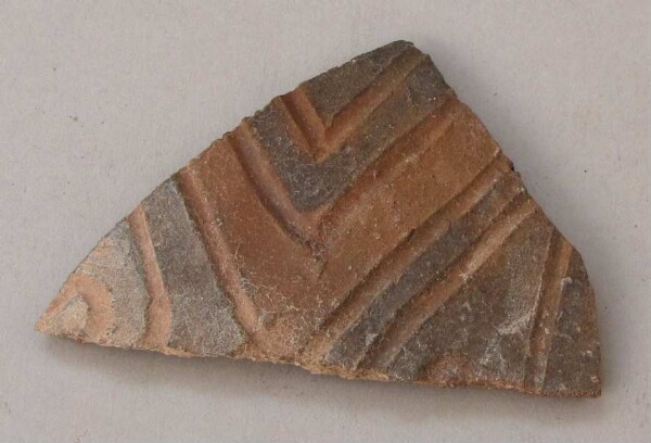 Fragment of a clay vessel