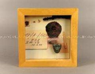 Wandschmuck mit Miniatur der Gesichtsmaske von Kalkriese