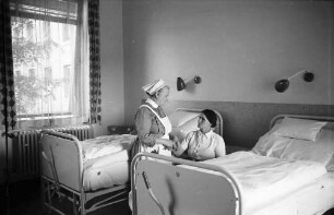 Freiburg: Schwester und Patientin