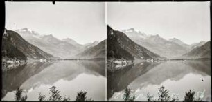 Lago di Poschiavo mit Blick von Südosten auf die Ortschaft Prese am Seeufer