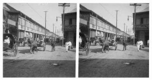Straßenszene mit Ochsenkarren in Manila : Weltreisen. Manila. Straßenszene mit Ochsenkarren