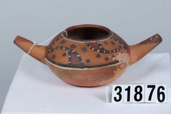 Vessel with handle and spout