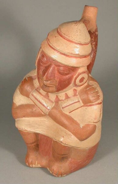 Seated anthropomorphic figure