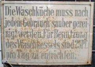 Hinweisschild " Die Waschküche..."