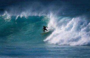 Spanien. Gran Canaria. Las Palmas. Bahia del Confital. Wellenreiter