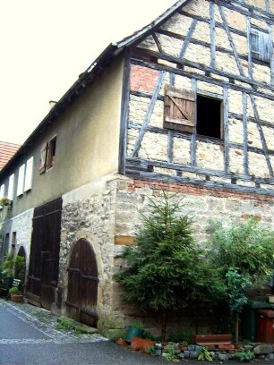 Stadtbild - Haus des Philippus Vogel (Jahr 1557) in eckständiger Ansicht Fachwerk-Obergeschoß (ausgemauert) auf steinernem Stock