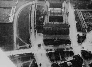 Szene aus dem Dokumentarfilm "Flugbetrieb auf dem Flughafen Dresden-Kaditz": Königsufer mit Carolabrücke, Wiesentorstraße, Finanzministerium und Jägerhof