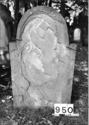 Grabstein 950 (Index: 99630442) Material: Sandstein Zustand: völlig abgeblättert Maße HxBxT: 92x53x9 cm Beschreibung: Stele mit eingezogenem Rundbogenabschluß: Grabstein 950