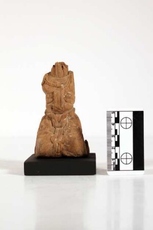 knieende kopflose Holzstatuette