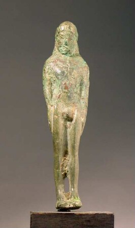 Archaische (?) Statuette eines Jünglings im Kurosschema