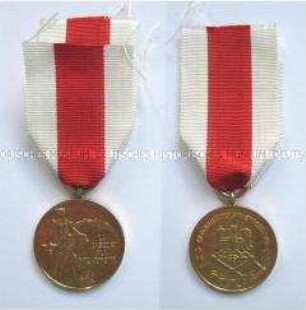 Medaille für Verdienste im Feuerlöschwesen, Ausführung in Gold, Volksrepublik Polen