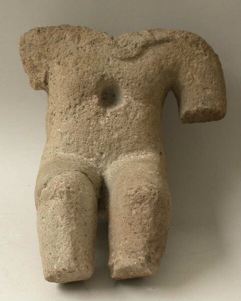 Torso of a stone figure