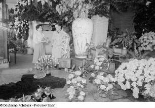 Kunden in einem Blumenladen