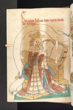 König am Pult blättert in einem Buch