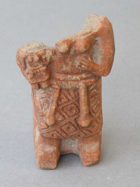 Lower part of a clay figure