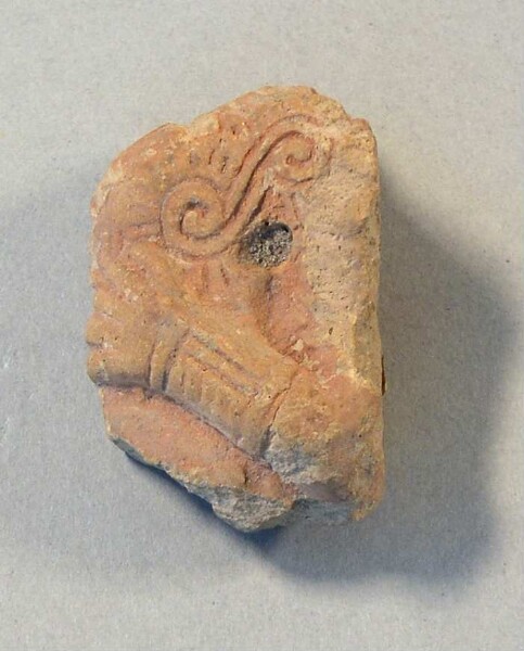 Fragment de figurine en argile