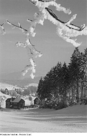 Winterlandschaft mit Wohnhäusern