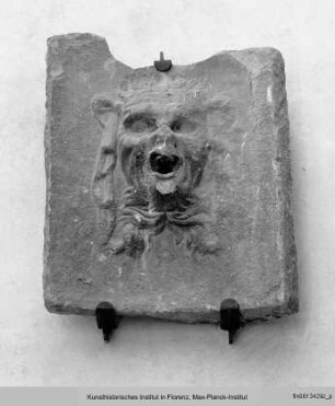Relief mit einer Groteske