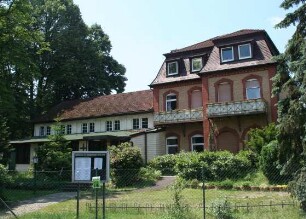 Kath. Kirche (ehem. Gaststätte 'Forsthaus Buchschlag') (Massivbau); Dreieich, Rudolf-Binding-Weg 6