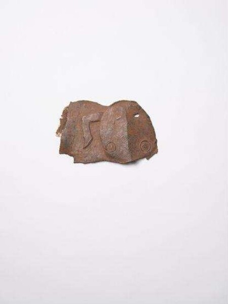 Bronze plate with catfish head, fragment