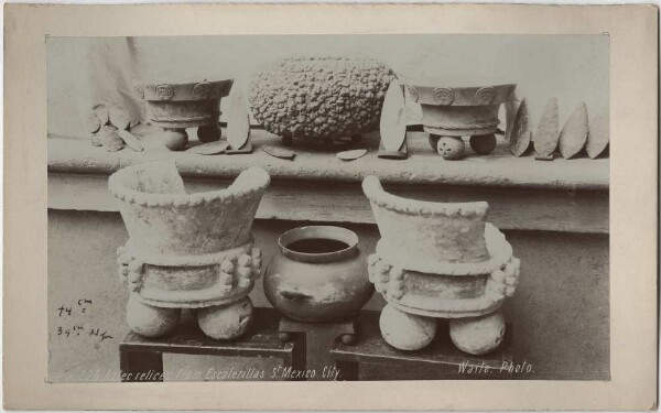 Clay vessels and arrowheads.