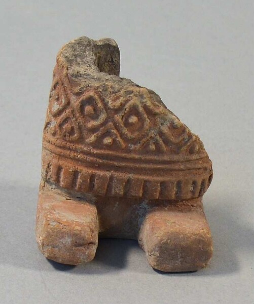 Lower part of a clay figure