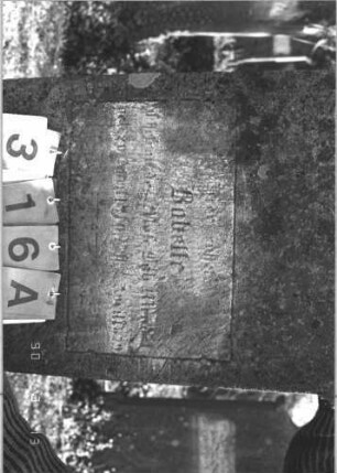 Grabstein 316 (Index: 99786312) Zustand: Vorderseite: vollständig abgeblättert, Rückseite: leicht verwittert Maße HxBxT: 143x58x23 cm: Grabstein 316A