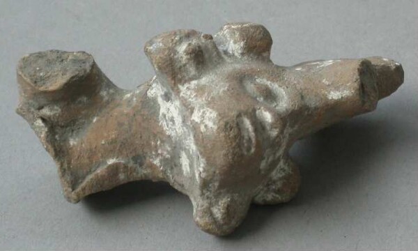 Fragment of a clay rattle (clay head)