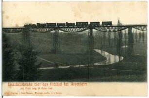 Assenheim. Assenheimer Brücke mit Eisenbahnzug