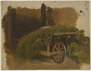 Karren mit geschnittenem Gras beladen