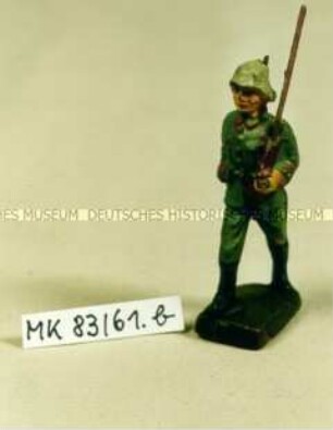 Spielzeugsoldat: Soldat, marschierend mit Gewehr