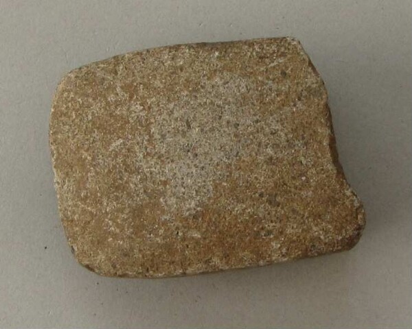 Stone axe blade (fragment)