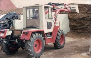 Fotografie: Ein- und Auslagerungstechnik, Flachsilo, Fahrsilo, Maissilage, Frontlader, Silageentnahme