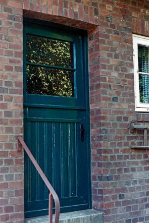 Sieker Landstraße 161: Wohnhaus aus Backstein, mit Zeltdach: Teilansicht: Gartentür