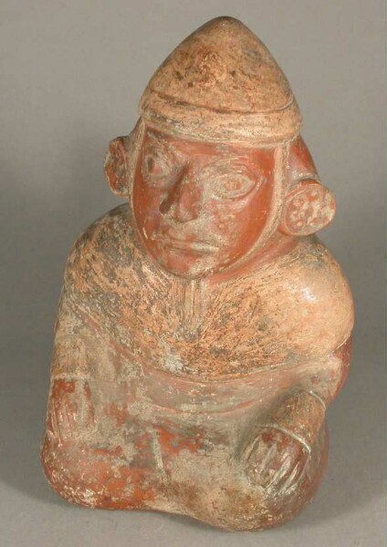 Seated anthropomorphic figure