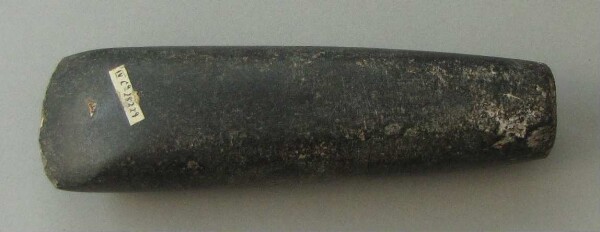 Stone axe blade (?)