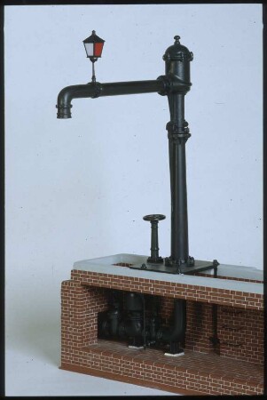 Modell eines Wasserkrahns