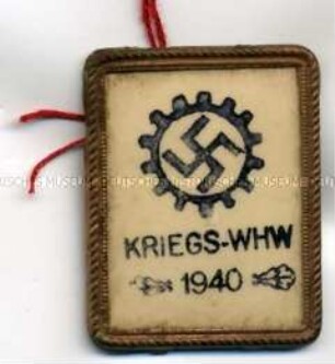 WHW-Abzeichen, Leuchtabzeichen mit DAF-Symbol, Straßensammlung im Gau München-Oberbayern vom Januar 1940