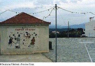 Plakat an einer Hauswand