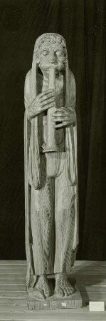 Flötenbläser : Langner, Reinhold (1905-1957): Flötenbläser. 1942. Holzplastik; Höhe 100 cm. Dresden: Staatliche Kunstsammlungen Dresden (SKD), Gedächtnis-Ausstellung 1958.01-1958.02 im Albertinum